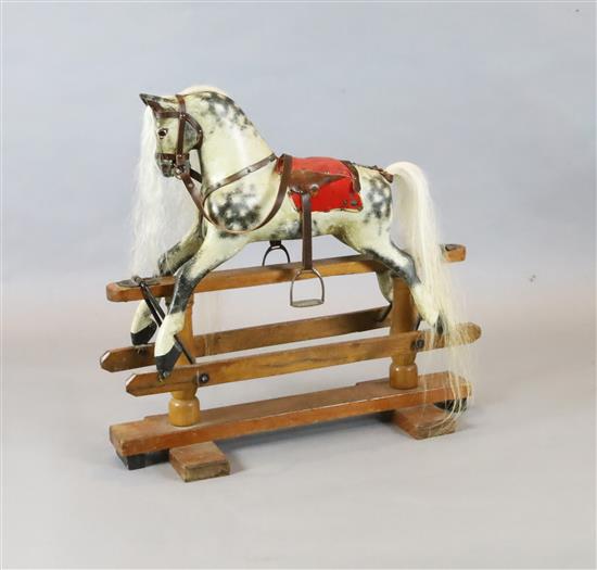 A F.H. Ayres carved and painted antique small rocking horse, original paint, H.30.5in. L.32in.